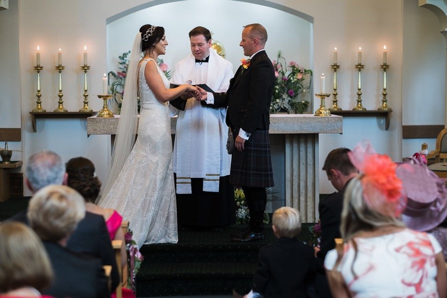 Bride and groom at altar