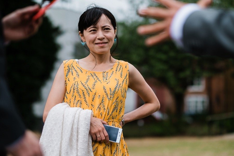 Guest outside West Bridgford Hall wedding photographer