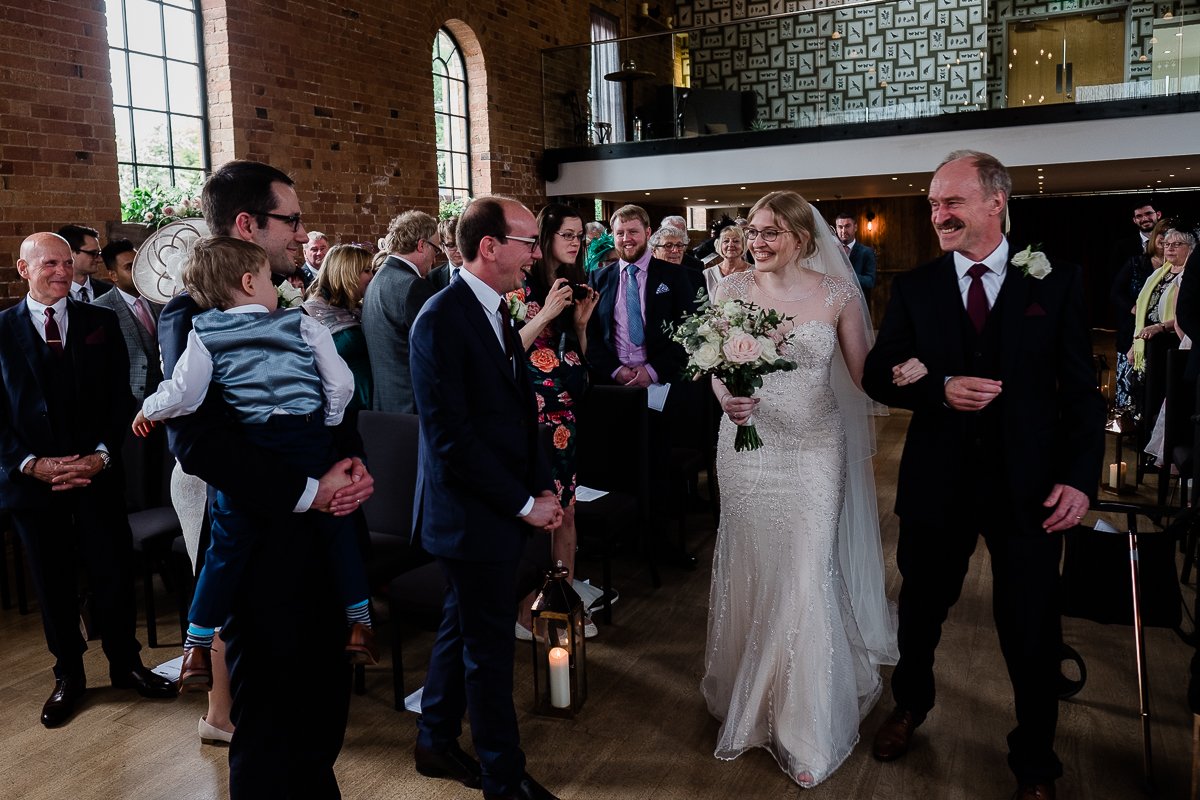 Carriage Hall Wedding 30 Bride walks down aisle