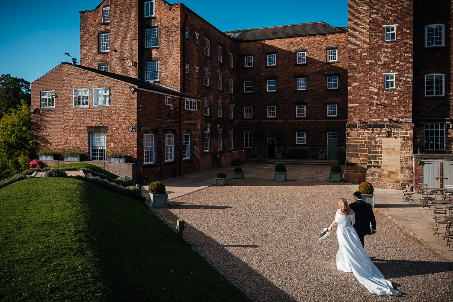 Bride and groom - just married - at The West Mill Exclusive Use Wedding Venue Derby