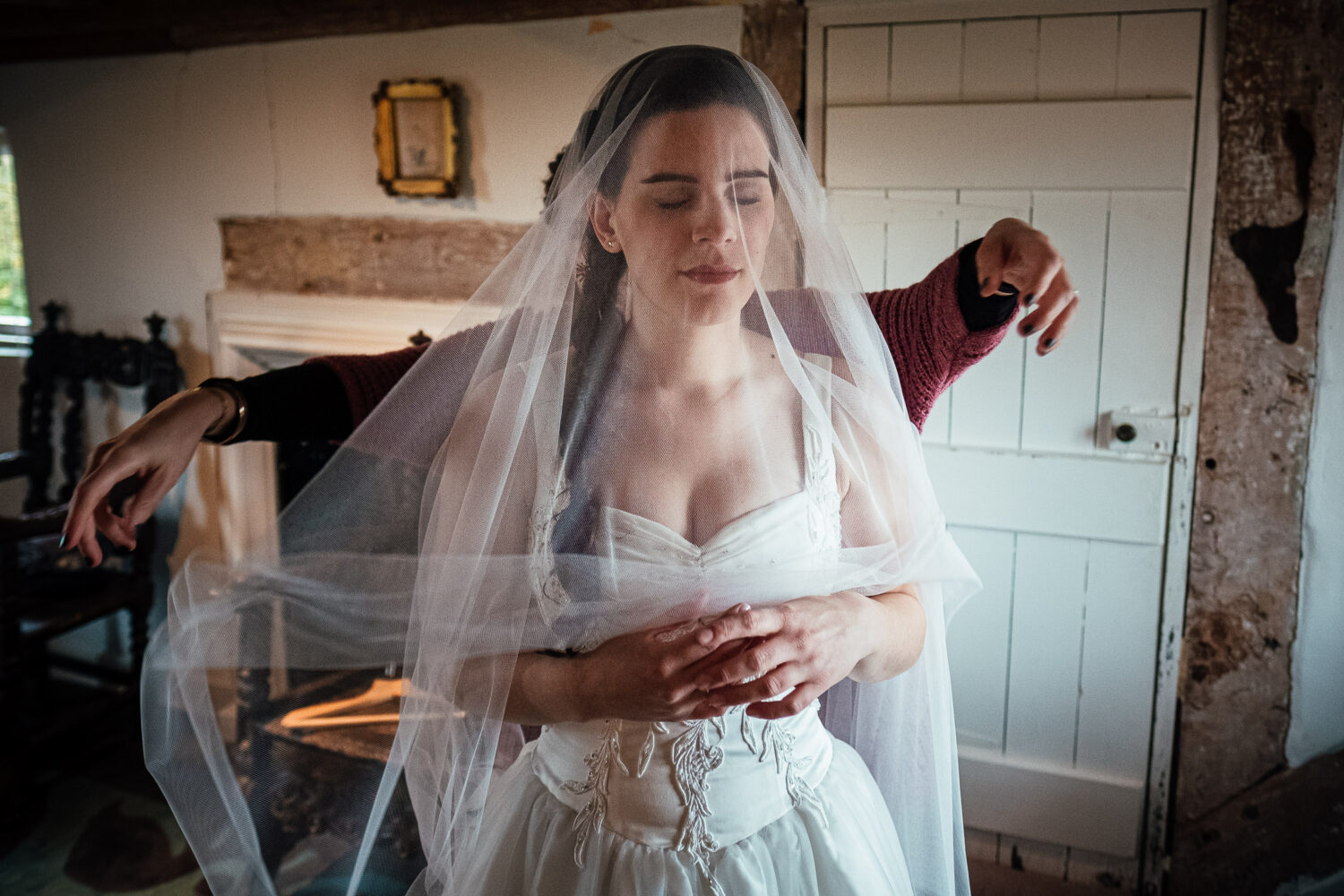 Bride puts on veil