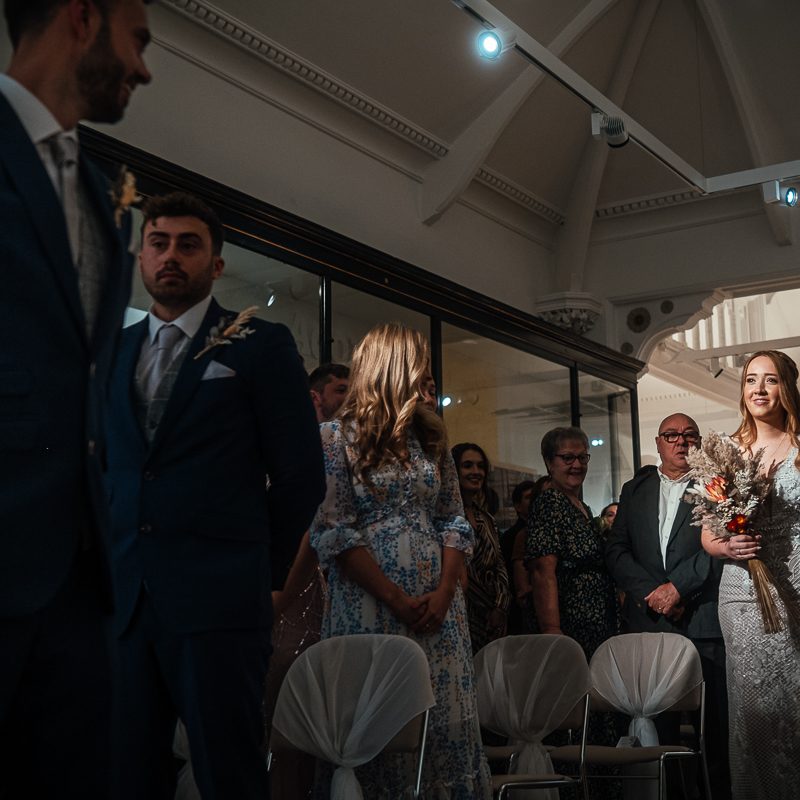 Bride Walks down the aisle at Derby Museum Wedding Ceremony
