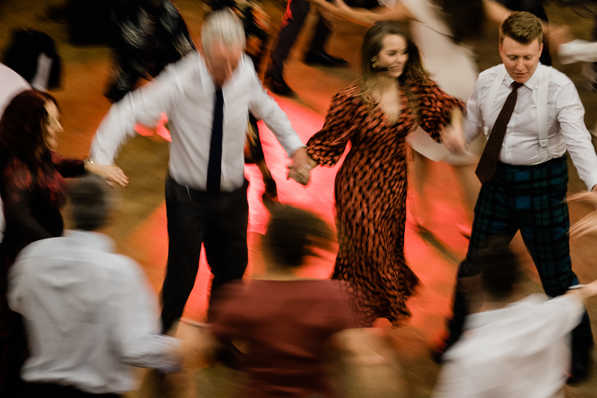 How Japanese Philosophy Shapes My Wedding Photography 1 Ceilidh Dancing at The Whitworth Centre Wedding Reception