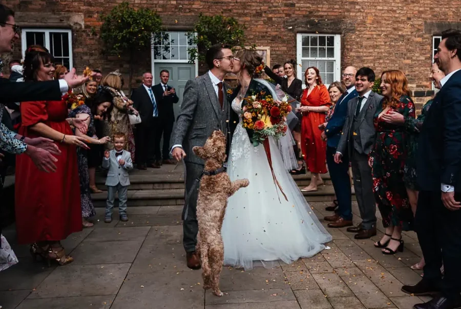 Documentary Wedding Photographer Derbyshire | Simon Dewey 20 Guests throw Confetti Outside The West Mill Exclusive Use Wedding Venue