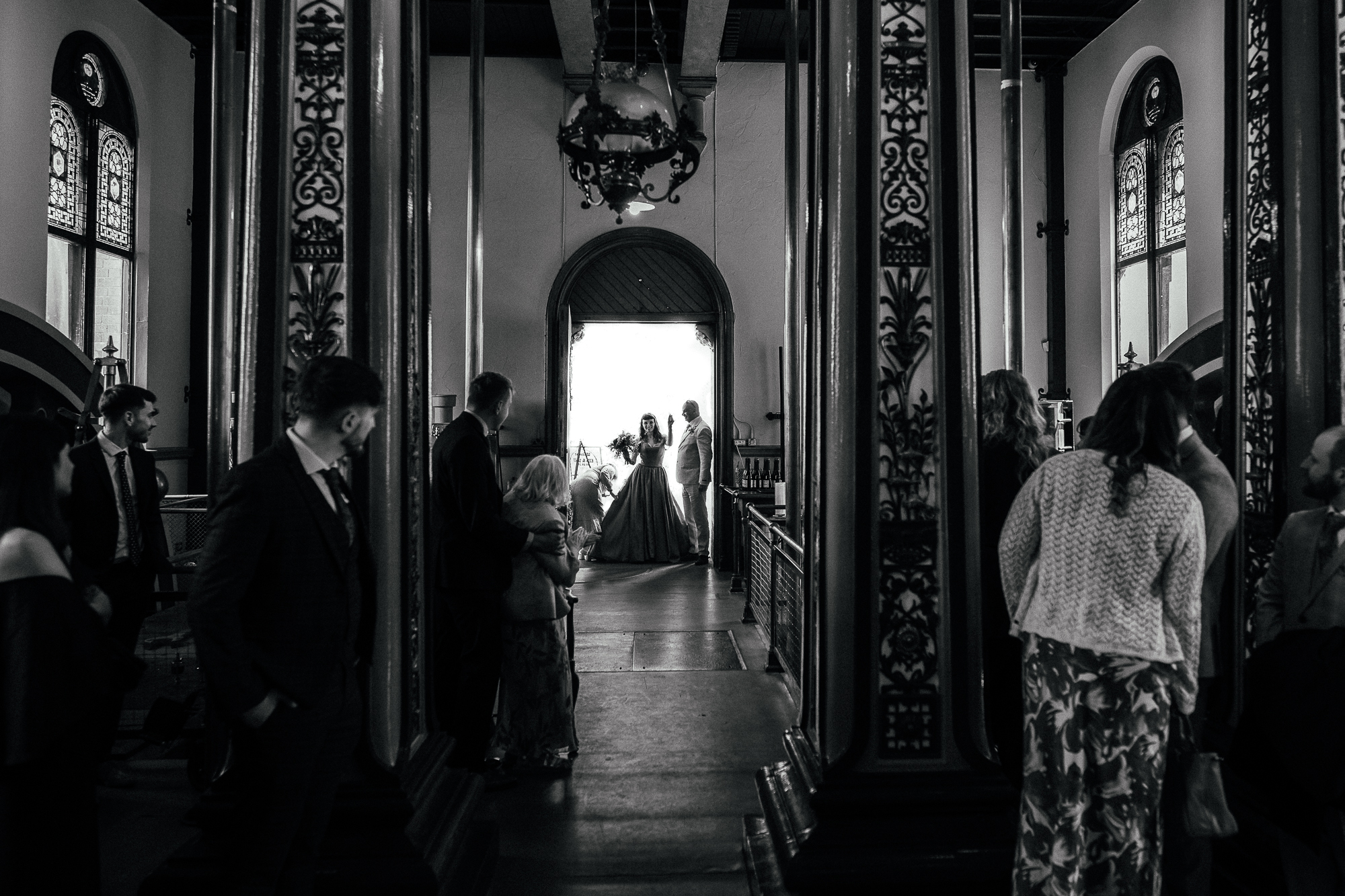 Papplewick Pumping Station Documentary Wedding Photography. Bride arrives grainy, black and white photograph.